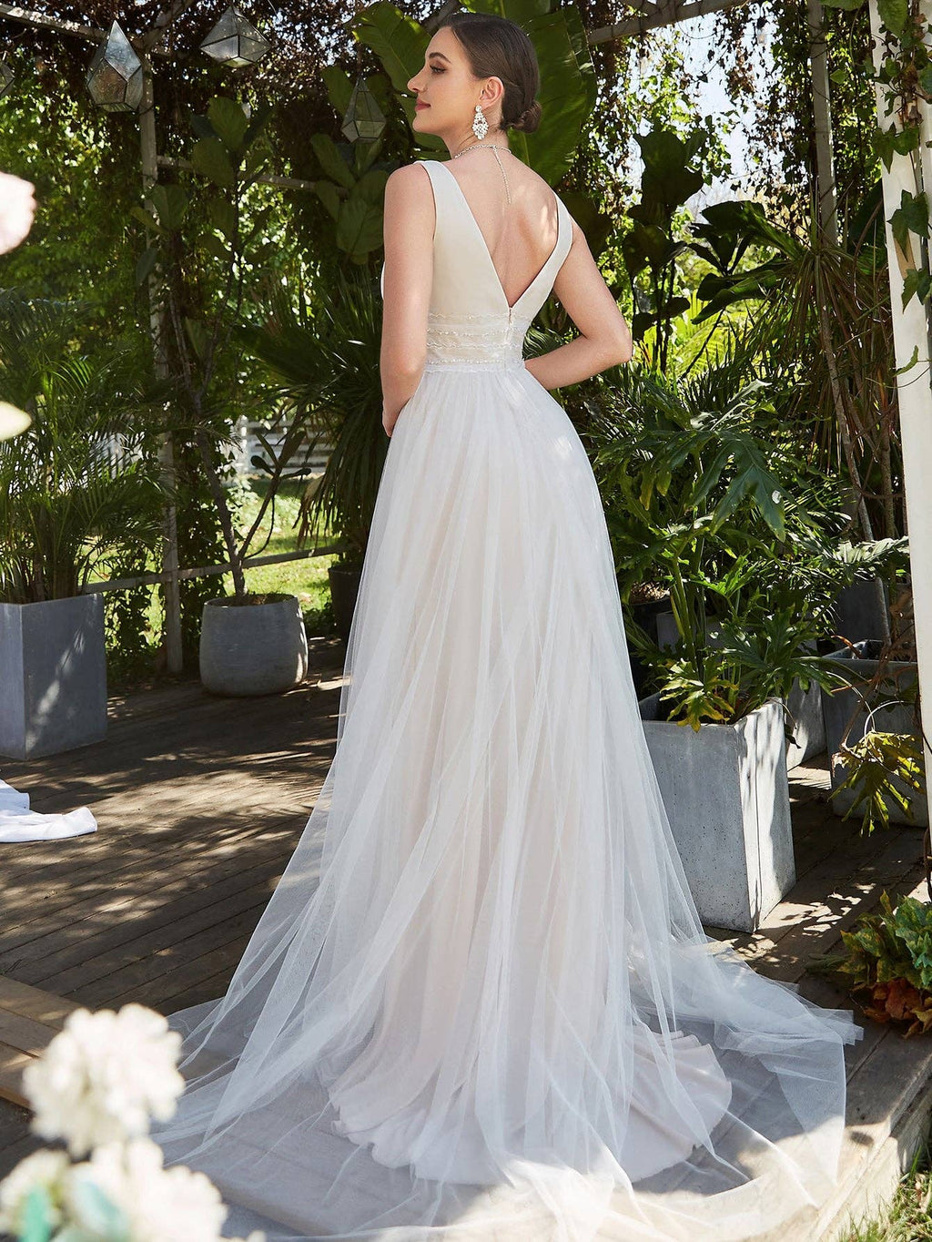 Elegant Backless A-Line Sleeveless Ivory Wedding Dress with Deep V-Neck