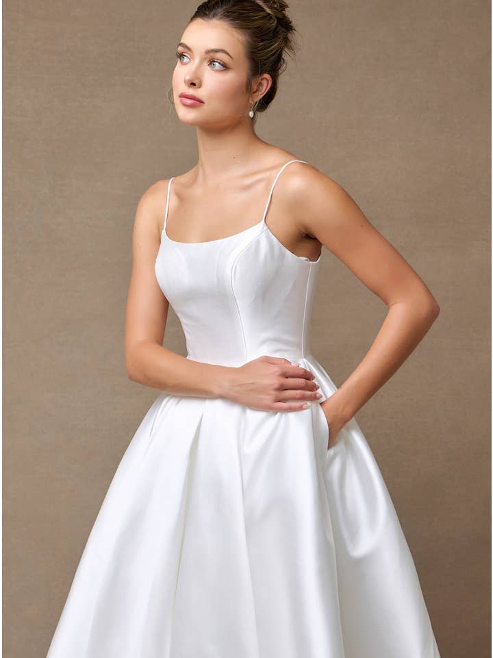 Elegant Off-White Sleeveless A-Line Mikado Wedding Gown with Pockets and Bow