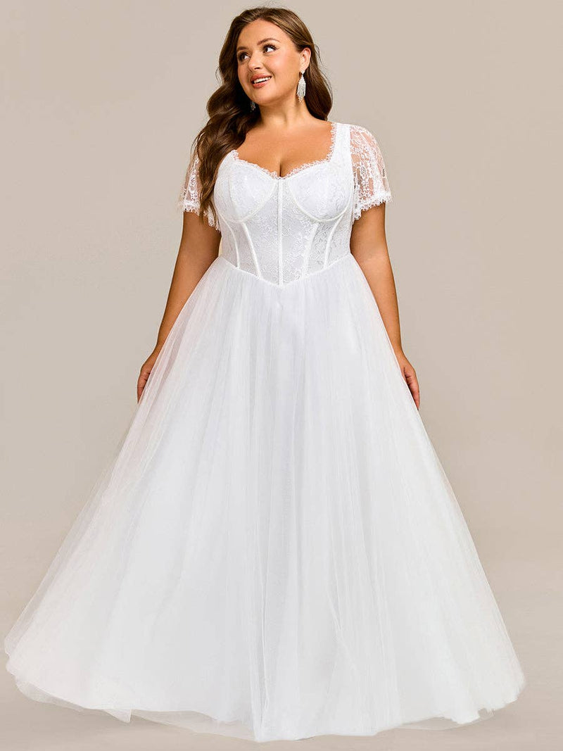 {Elegant A - Line Sweetheart Wedding Dress with Ruffle Short Sleeves & Tulle Details} - {} at {Linda Mariposa}