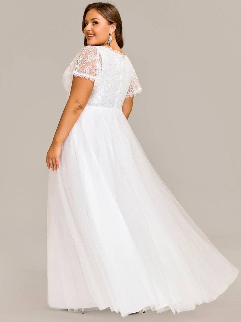 {Elegant A - Line Sweetheart Wedding Dress with Ruffle Short Sleeves & Tulle Details} - {} at {Linda Mariposa}