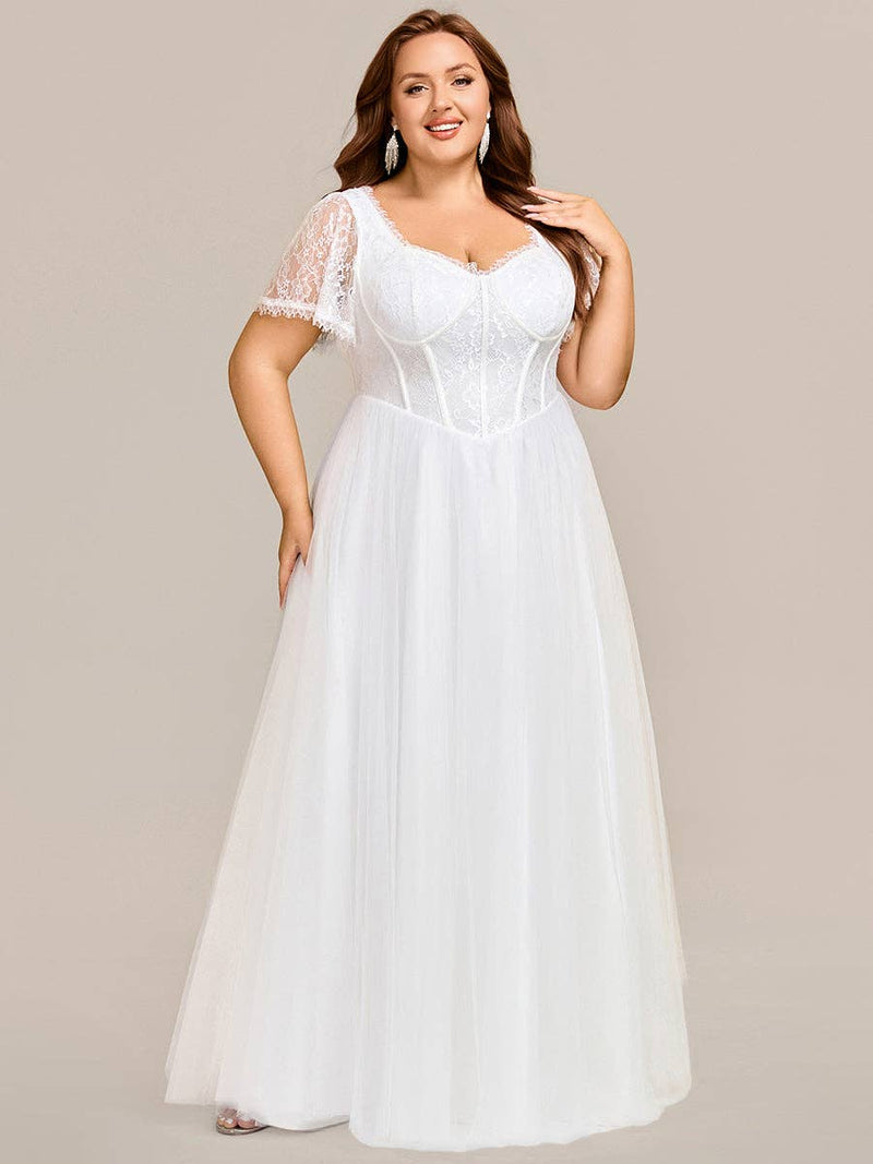 {Elegant A - Line Sweetheart Wedding Dress with Ruffle Short Sleeves & Tulle Details} - {} at {Linda Mariposa}