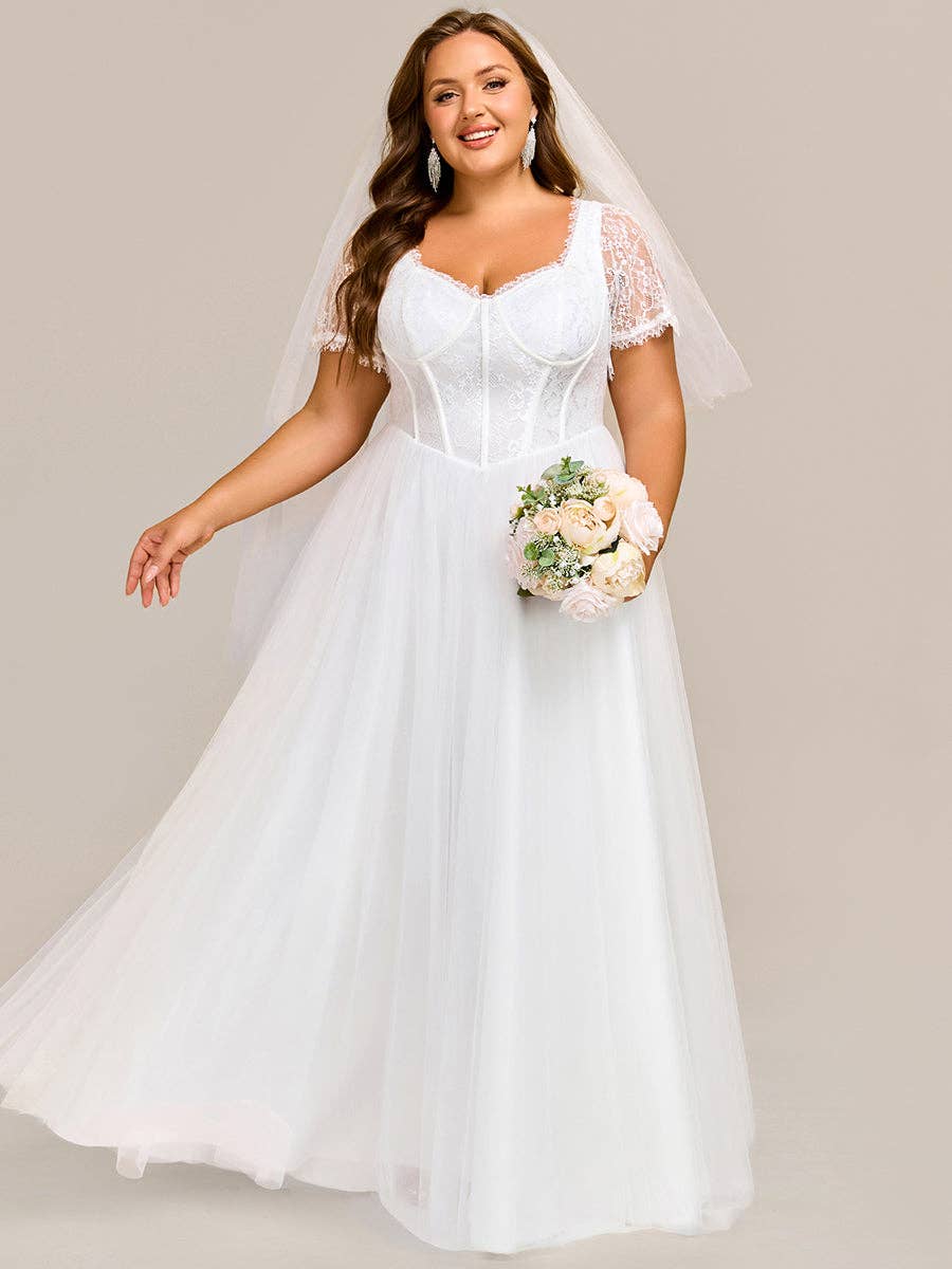 {Elegant A - Line Sweetheart Wedding Dress with Ruffle Short Sleeves & Tulle Details} - {} at {Linda Mariposa}