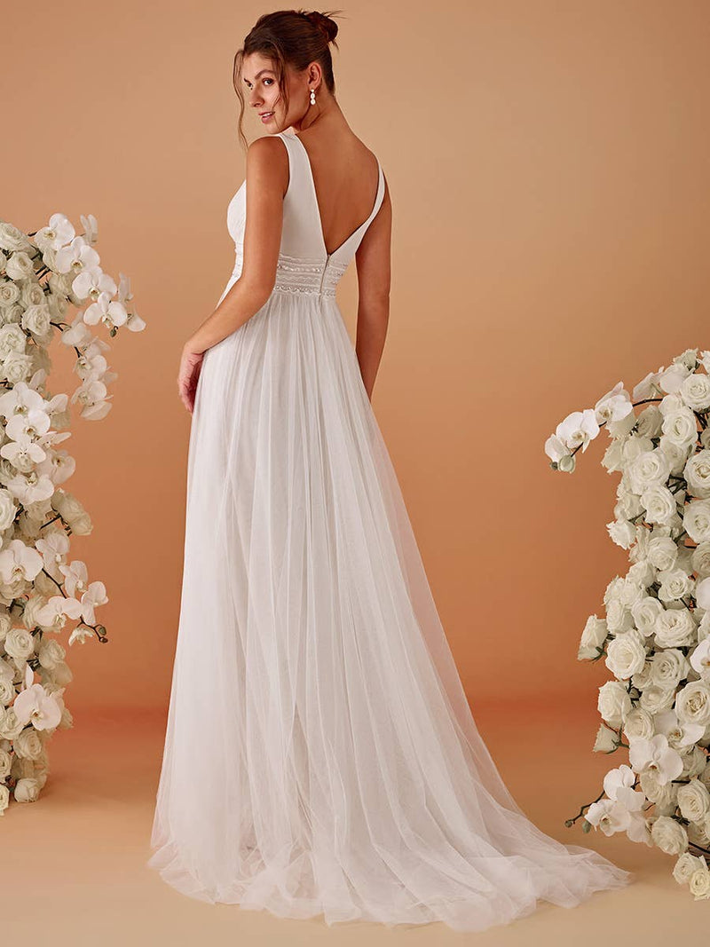 {Elegant Backless A - Line Sleeveless Ivory Wedding Dress with Deep V - Neck} - {} at {Linda Mariposa}