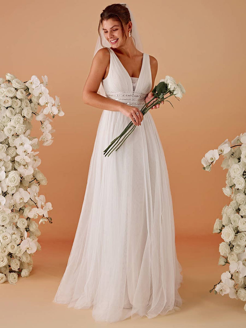 {Elegant Backless A - Line Sleeveless Ivory Wedding Dress with Deep V - Neck} - {} at {Linda Mariposa}