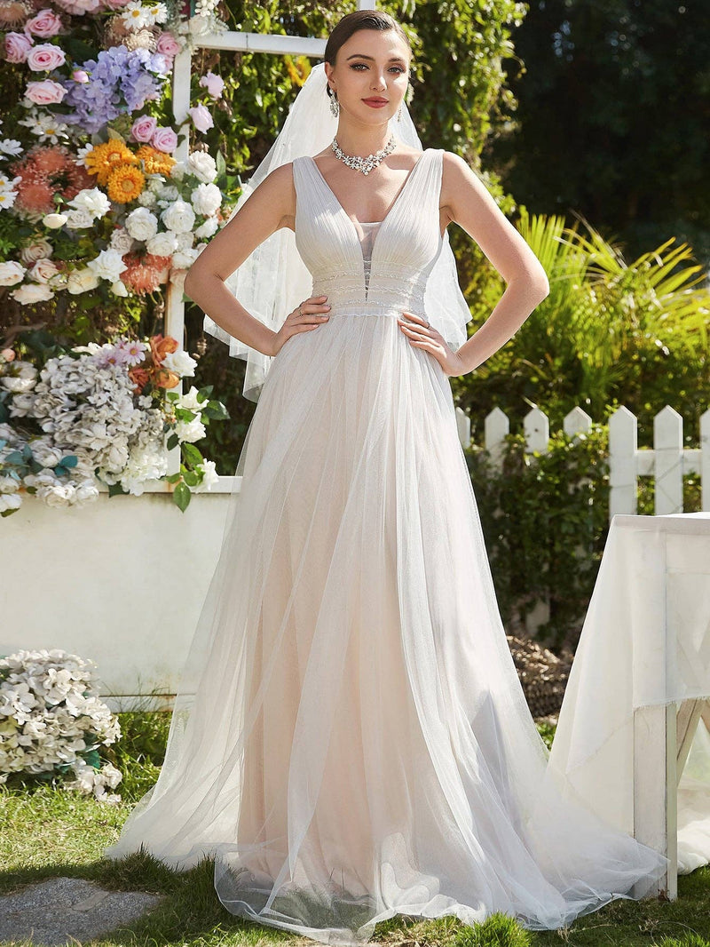{Elegant Backless A - Line Sleeveless Ivory Wedding Dress with Deep V - Neck} - {} at {Linda Mariposa}