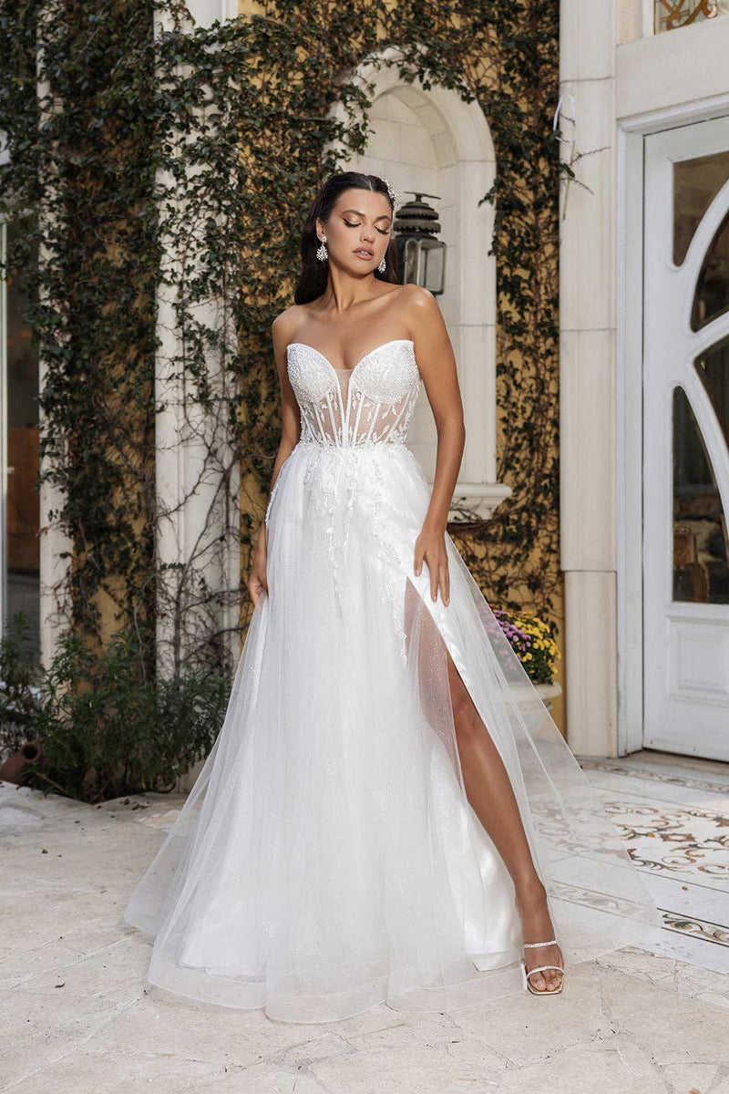 {Elegant Ivory Strapless A - Line Tulle Wedding Dress with Glitter Corset Bodice} - {} at {Linda Mariposa}