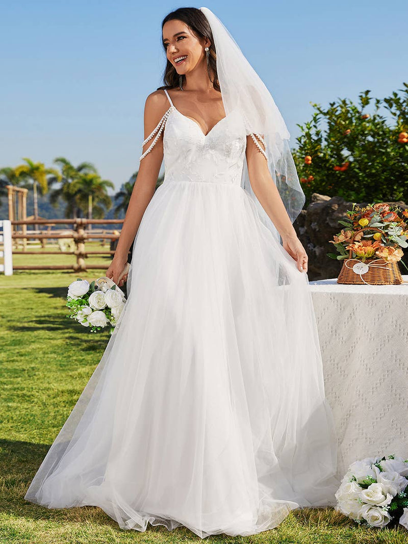 {Elegant Pearl Beaded Spaghetti Strap Cold Shoulder Tulle Wedding Dress Gown} - {} at {Linda Mariposa}