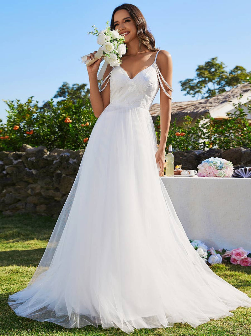 {Elegant Pearl Beaded Spaghetti Strap Cold Shoulder Tulle Wedding Dress Gown} - {} at {Linda Mariposa}